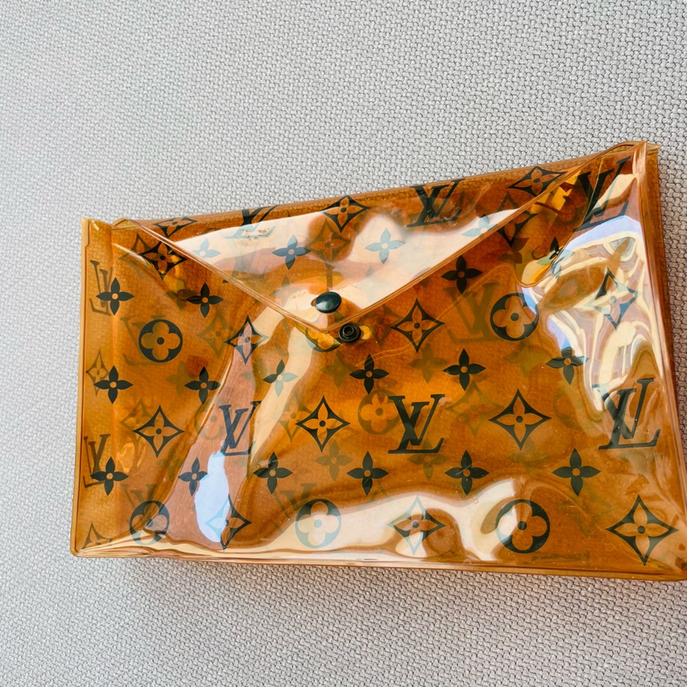 Louis Vuitton Pouch for Swim Monogram Embossed
PVC Clear Orange